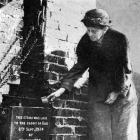 Mrs Skinner, wife of Waitahuna's first minister, lays the foundation stone for a new Presbyterian...