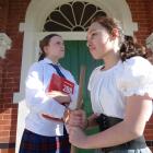 St Kevin’s College pupils (from left) Jemima Riley-Duddin and Okeroa Jamieson, both 15, are...