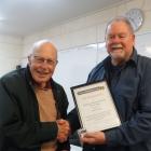 North Otago Citizens Advice Bureau chairman Paul Hebden (right) presents Alan Kerby with his...