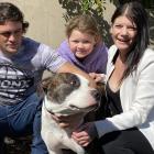 Quaid Brennan and Millie Russell, with Ariella Russell (8), said Onyx was a "loving dog". Photo:...