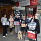 HeadQuarters Hairdressing George St staff (from left) Sariah Krueger, Tania Downer, Isabelle...