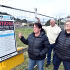 West Harbour residents (from left) Kristina Goldsmith, Jarrod Hodson and Ange McErlane are upset...