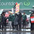 Woolworths union members from the chain’s supermarkets around Dunedin gather outside the South...