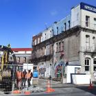 Contractors working on the empty section next door to the Crown Hotel in Rattray St. Photo: Peter...