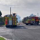 Fire crews and police at the scene of a house fire in Crawford St, Invercargill, yesterday. PHOTO...