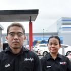 Dunedin Wendy’s Hamburgers general manager Paul Abordonado (left) and staff Lanie Geron and Caleb...