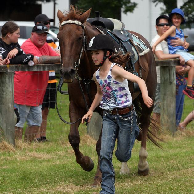 Caitlyn Forde, of Balclutha, leads Breeze home in her walk trot lead agility race at the Lawrence...