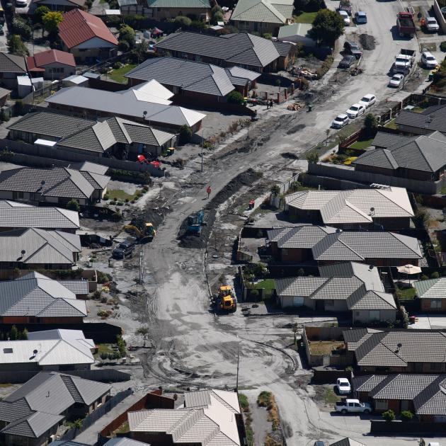 A street in Bexley after the liquefaction caused by the February 22, 2011, quake. Photo: NZ Herald