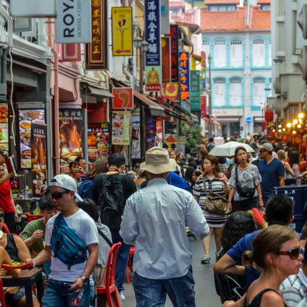 Eating out on the busy streets of Singapore’s Chinatown. PHOTOS: ISTOCK / TNS