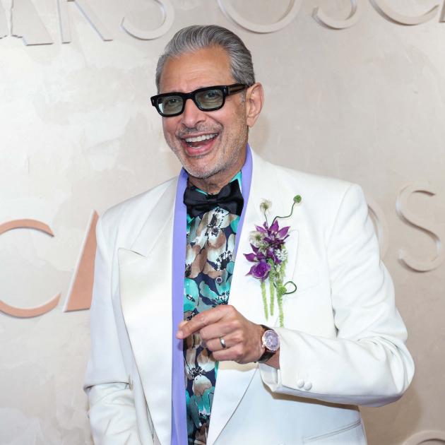 Jeff Goldblum matched his lilac shirt with a flamboyant boutonniere. Photo: Reuters 