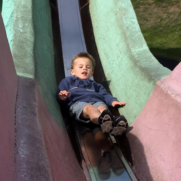 Max Norris (3) has a go on the slide. PHOTO: SHAWN MCAVINUE









