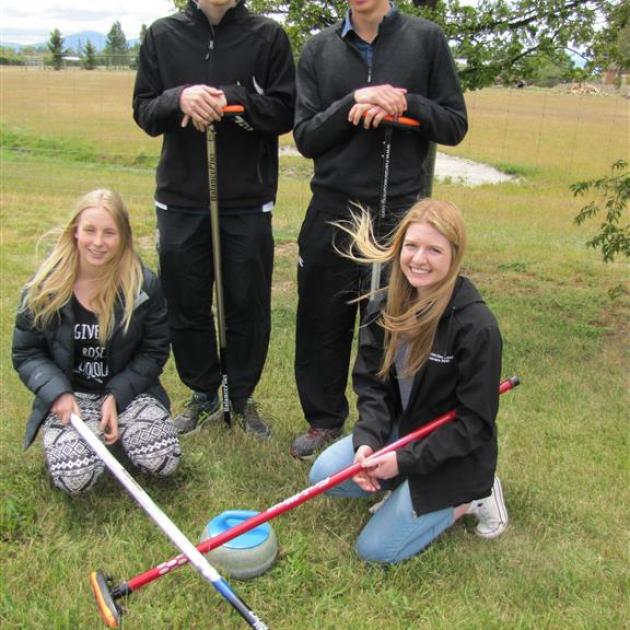 Curlers Courtney Smith (15), Matt Neilson (16), Ben Smith (16) and Holly Thompson (17), of Maniototo Area School, hope their teamwork will lead them to victory at the Youth Winter Olympic Games next year. Photo by Jono Edwards