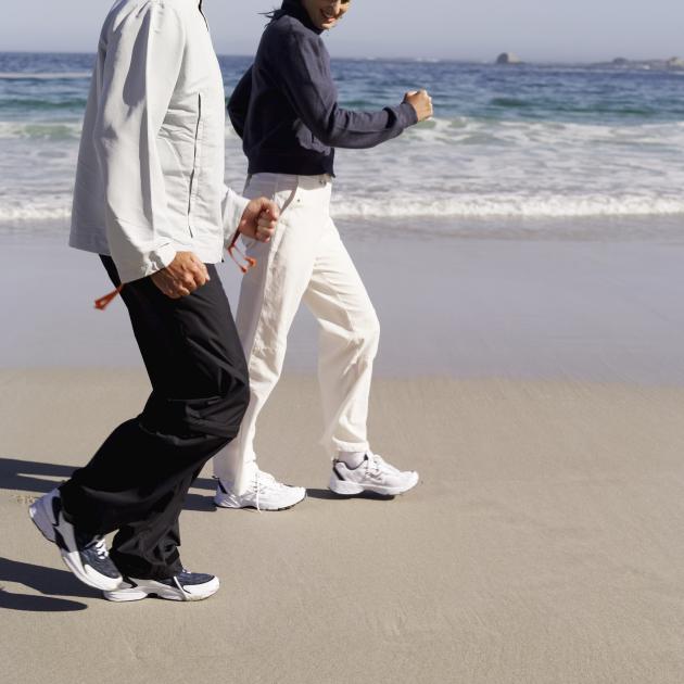 Sand walking is a great exercise to relieve stress. Photo: Getty Images 