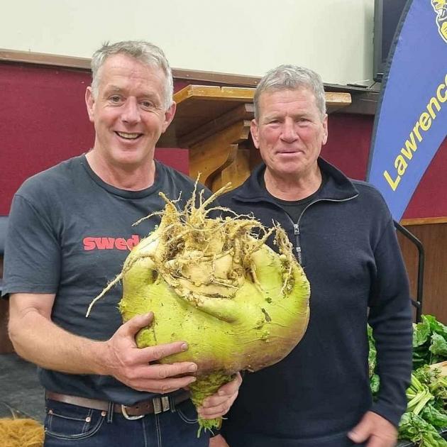 Hamish Brown (left) shows off his enormous swede as guest speaker Richard Loe squeezes into frame...