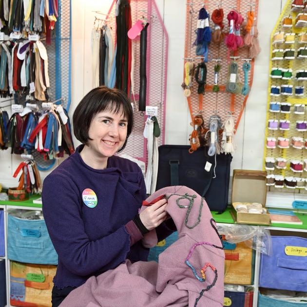 Stitch Kitchen manager Fiona Jenkin works on a Toni Darling jacket she found in an op-shop. PHOTO...