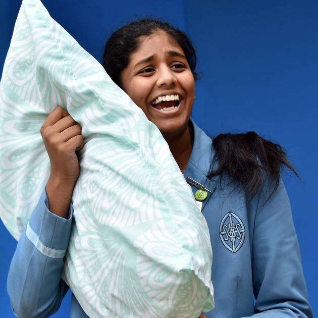 St Hilda’s Collegiate year 11 student Megha Senthilkumar rests her head on her pillow for some...