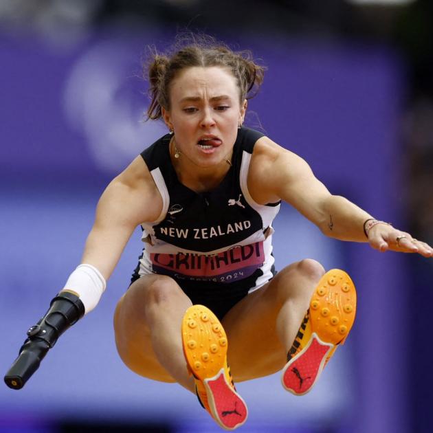 Anna Grimaldi, of Dunedin, competes in the T47 women’s long jump at the Paralympic Games in Paris...