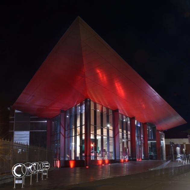 Toitū Otago Settlers Museum takes on a red hue. PHOTO: PETER MCINTOSH