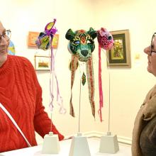 Rhonda Robertson (left), of Oamaru, and Kari Sheat, of Alexandra, admire 'Come into the Garden'...