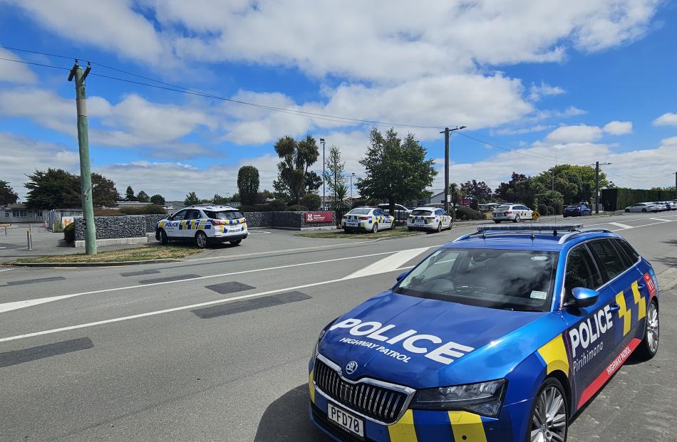 There was a large police presence on Boundary Rd outside Lincoln High on Thursday. Photo: Daniel...