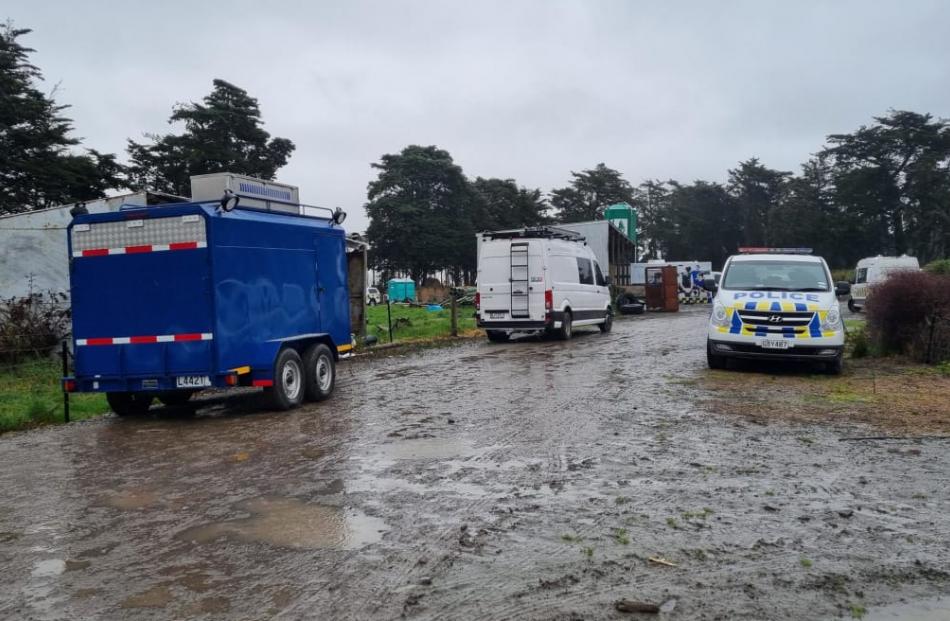 Police searching the area on Tuesday. Photo: RNZ / Jean Edwards