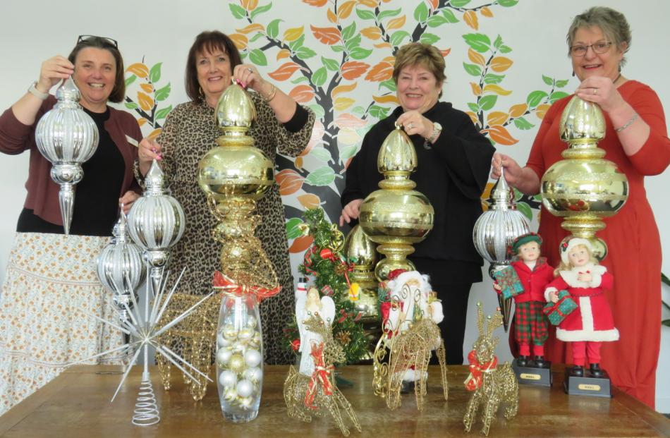 Hospice Mid Canterbury hospice manager Nicole Williams (left) and committee members Barbara...