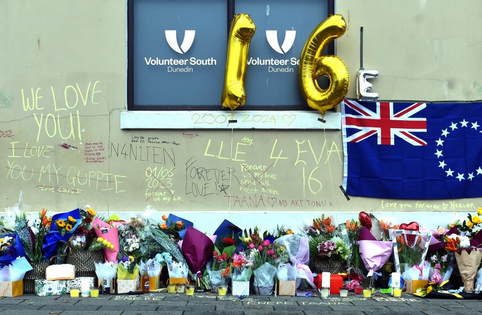 Flowers and tributes at the Dunedin bus hub in memory of Enere. Photo: Gregor Richardson