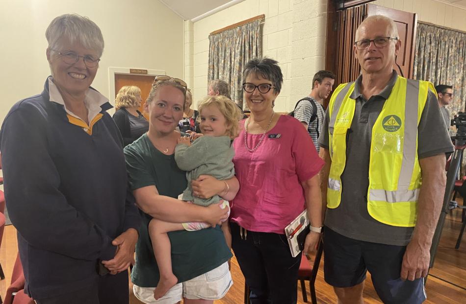 Glenmark Drive residents Mandy Burrows (left) and Elaine McCarthy with Isla were evacuated to the...