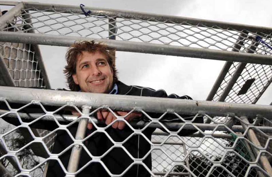 Pete Dryden inside the cage from which tourists will be able to see great white sharks off...