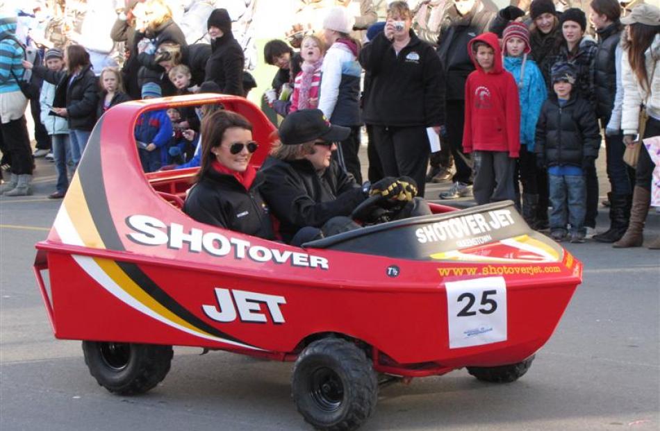 Shotover Jet swapped river for road on parade day. Photo by James Beech