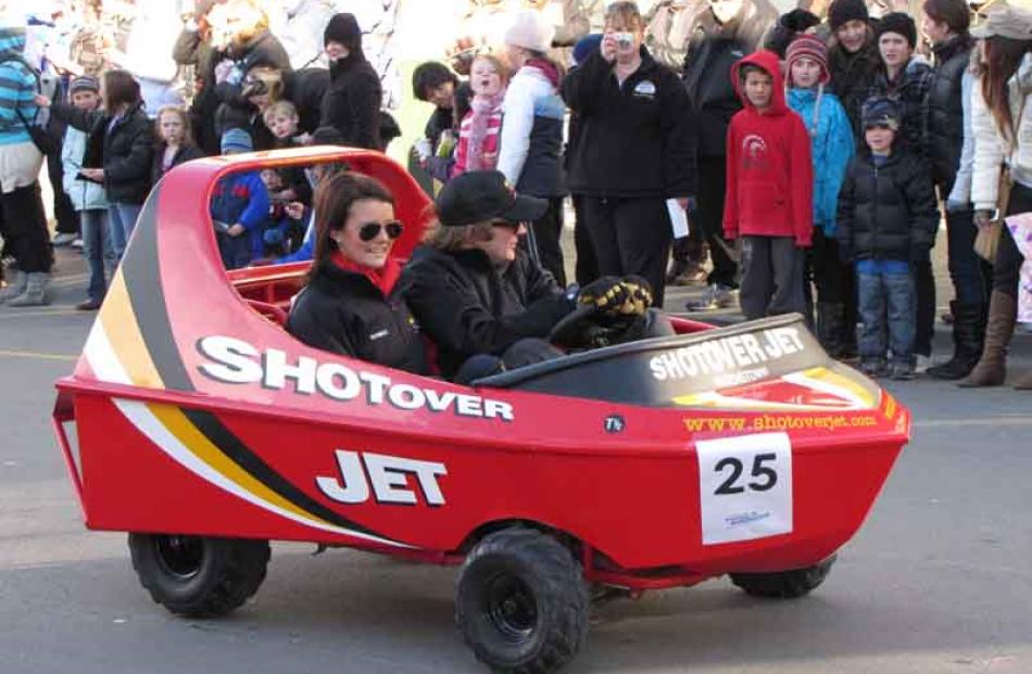Tourist operator Shotover Jet swaps water for asphalt on parade day.