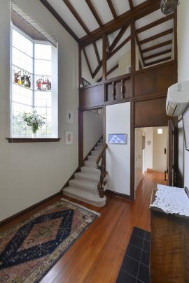 Wood and stained glass feature in the entry foyer.