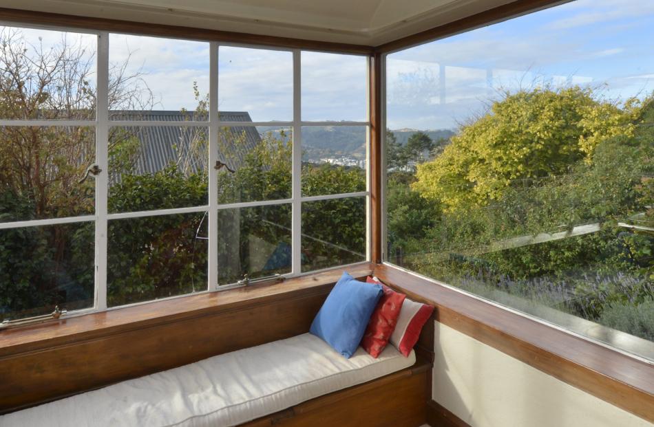 A window seat is an ideal place to linger. ‘‘It’s rare to have a house of this era built to the...