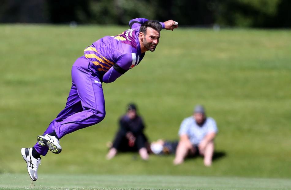 Andy Ellis, of Canterbury, bowls during the Twenty20 Supersmash match between Otago and Canterbury yesterday in Alexandra. Photos: Getty Images