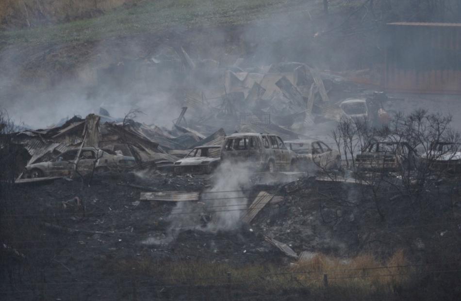 Burnt-out cars at the scene on Thursday morning. Photo Gerard O'Brien