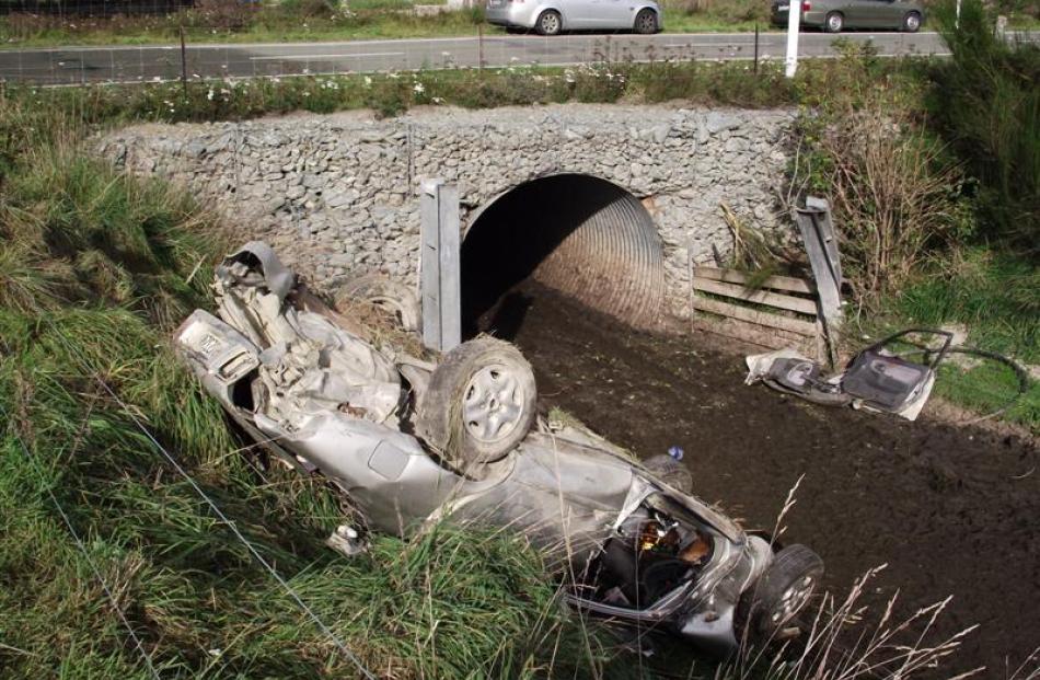 The Mazda 626 car which left SH83 and crashed into a stock underpass  east of the Otekaieke River...