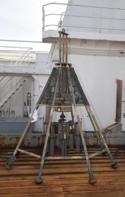 A rig which can take samples at almost 10km deep sits  on the deck.

