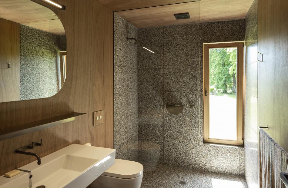 Terrazzo features in the two bathrooms.