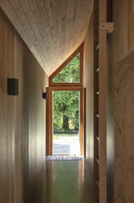 A ladder in the entry leads to a sleeping loft.