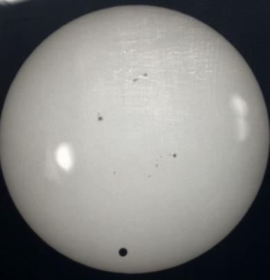 Vaugn Malkin submitted this image. The sun was projected through a telescope onto a screen and...