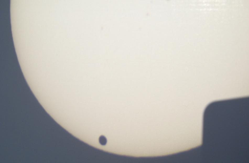 Vaugn Malkin submitted this image. The sun was projected through a telescope onto a screen and...