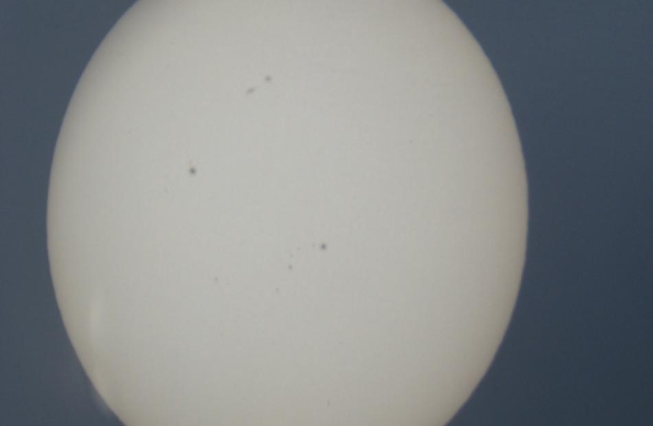 Vaugn Malkin submitted this image. The sun was projected through a telescope onto a screen and...