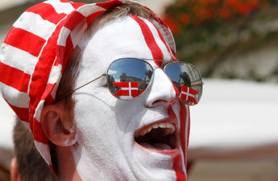 A Denmark fan shows his support before the match against Portugal in Lviv.