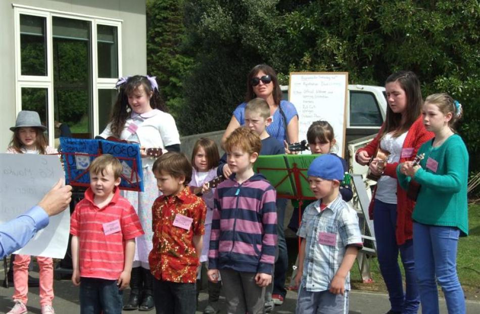 Pupils perform a song during  the  jubilee.