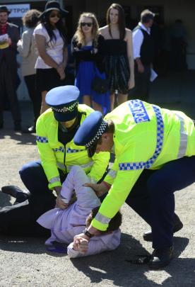 Police break up a fight.