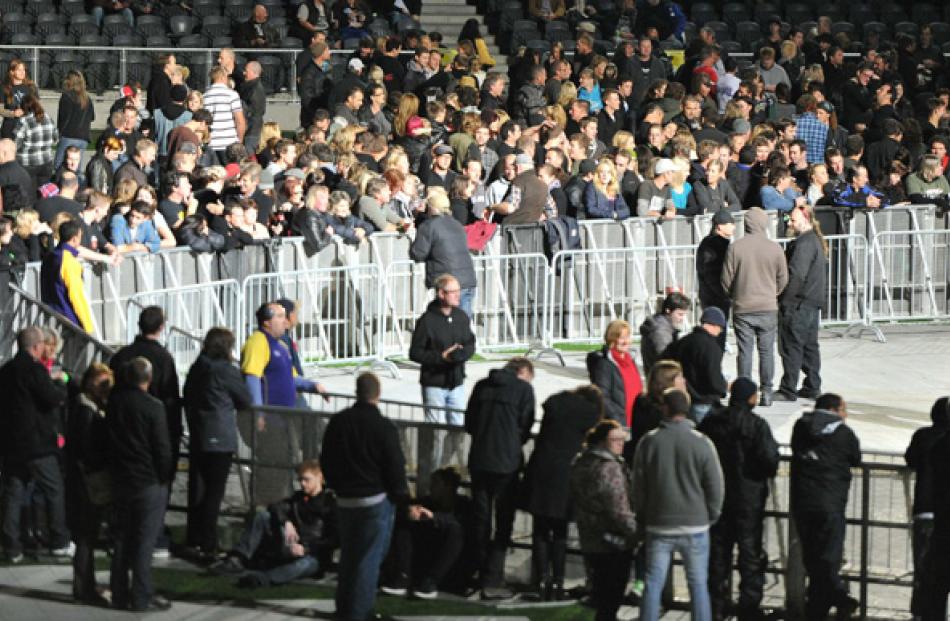 The crowd settles in at Forsyth Barr Stadium for the opening acts.