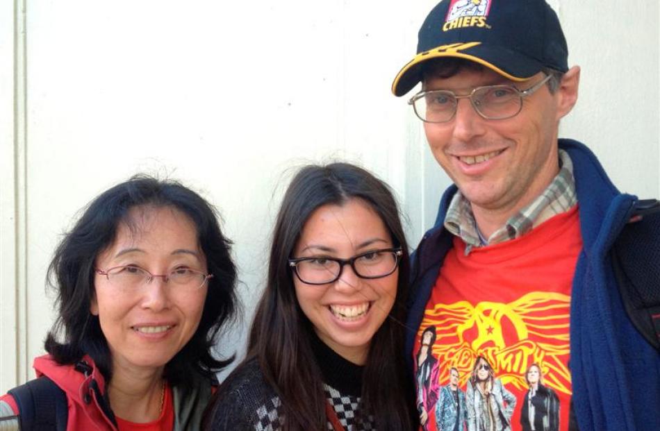 Aerosmith fans (from left) Yoko (47) Chiharu (17) and Carl Saunders (47), of Hamilton.