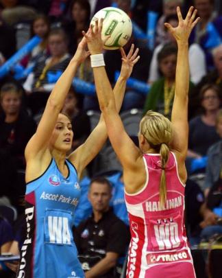 Southern Steel wing attack Courtney Tairi (left) looks for a way past Adelaide Thunderbirds wing...