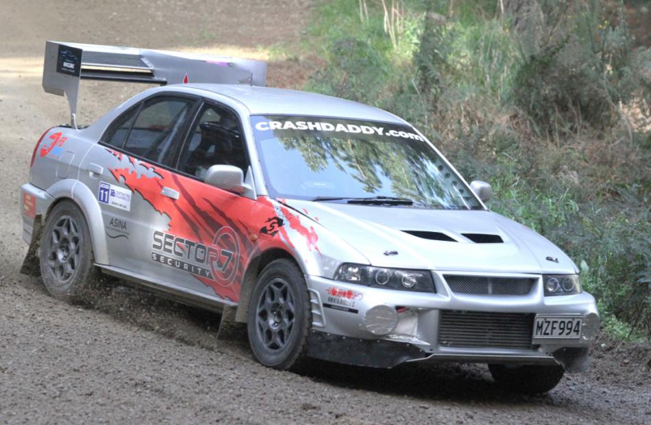 Nice drive . . . Stefan Moser-Rust of Mandeville piloted his Mitsuibishi EVO 6  into the final 32...