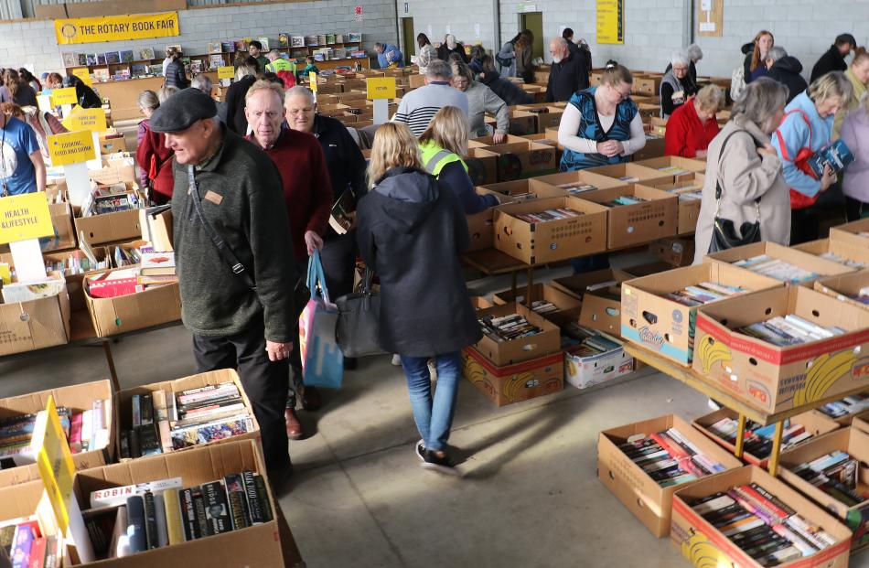 Searching . . . A large number of shoppers attended the Rangiora A&P show grounds last week PHOTO...